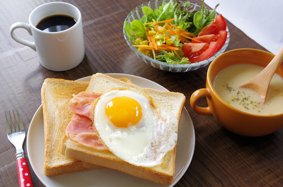 tea, bread with eggs and salad